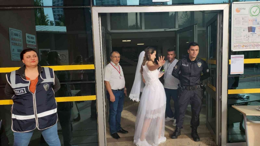 Gelinlikle nikah masasından önce sınav sırasına oturdu