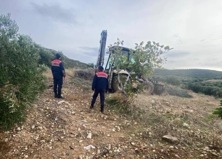 Hazine arazisinde izinsiz yer açarken yakalandı
