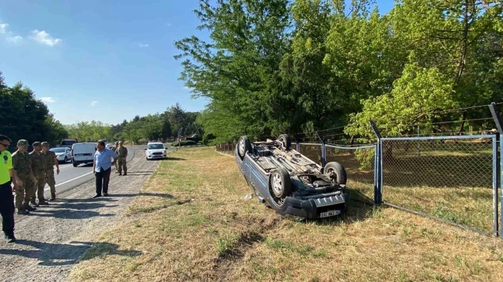 Takla atan araçta emniyet kemeri kurtardı
