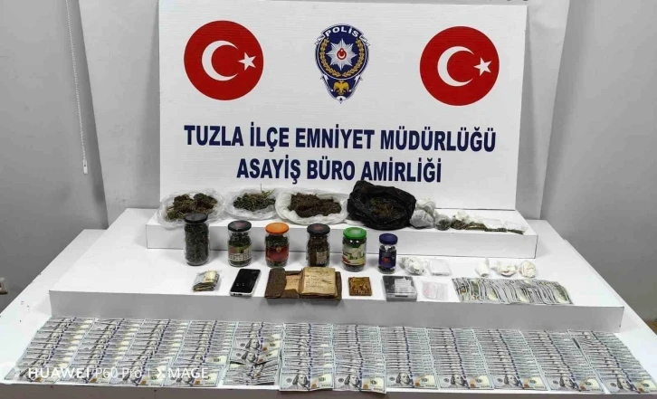 Tuzla’da yakalanan zehir tacirinin evinden farklı ülkelere ait nakit para çıktı
