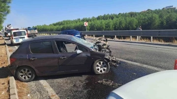 Hurdaya dönen araçtan sağ kurtuldular
