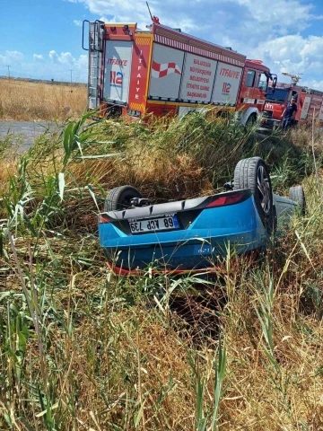 Takla atan otomobilden yaralı olarak kurtuldu
