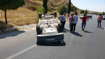 Takla atan otomobilin sürücüsü yaralandı
